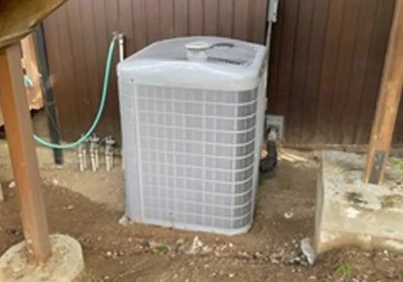 Carrier outdoor heat pump unit installed in a discreet location