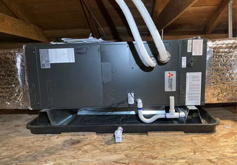 Mitsubishi heat pump installation in a 1946 Berkeley duplex